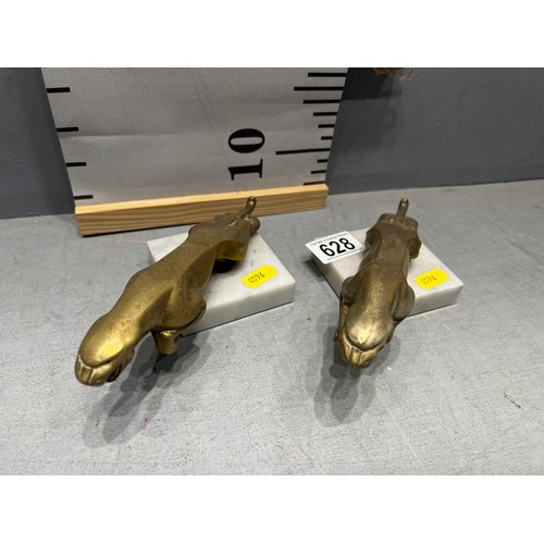 628 - Pair of early solid brass Jaguar car mascot on plinths