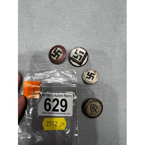 629 - 4 reproduction Nazi badges