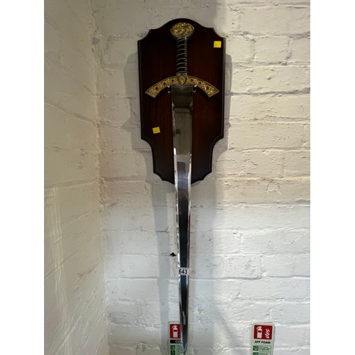 643 - Celtic Sword on wooden back plinth