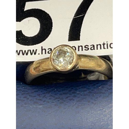 577 - 9ct gold solitaire diamond ring. Size N. approx 3g gross