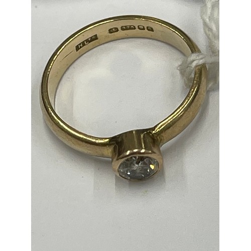 577 - 9ct gold solitaire diamond ring. Size N. approx 3g gross