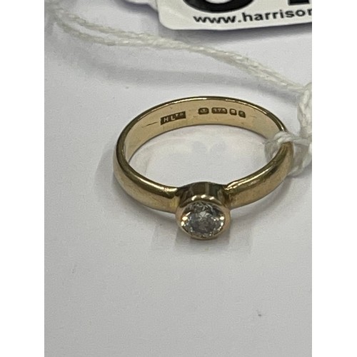 577 - 9ct gold solitaire diamond ring. Size N. approx 3g gross