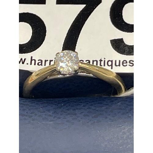 579 - 9ct gold solitaire diamond ring. Size M. approx 2.1g