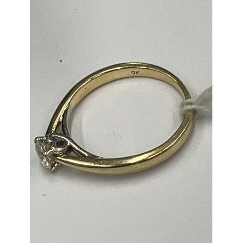 579 - 9ct gold solitaire diamond ring. Size M. approx 2.1g