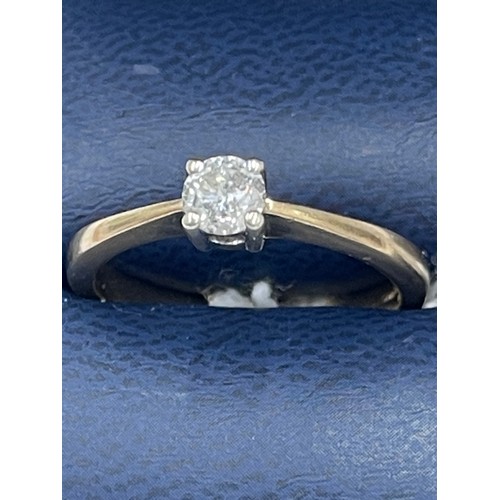 580 - 9ct gold solitaire diamond ring. Size P. approx 3g gross