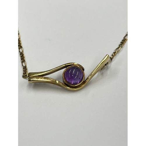 581 - 9ct gold chain with 9ct gold Amethyst pendant. approx 3.7g gross