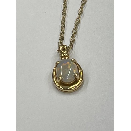 582 - 10ct gold pendant with opal on 9ct gold chain. pendant approx 0.7g gross. chain approx 0.6g gross