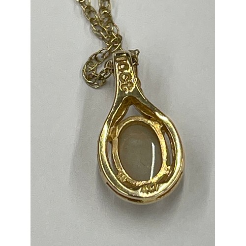 582 - 10ct gold pendant with opal on 9ct gold chain. pendant approx 0.7g gross. chain approx 0.6g gross