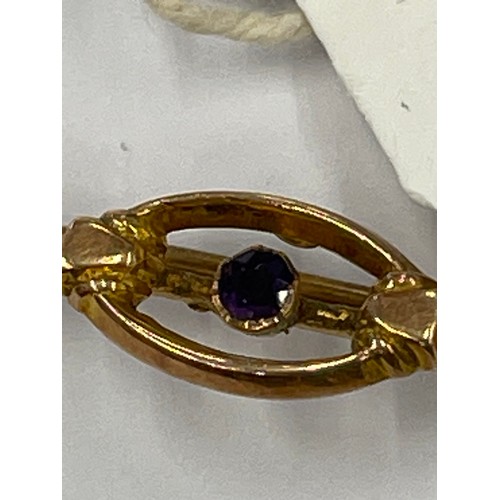 645D - 9ct gold bar brooch with Amethyst centre. approx 1.2g gross