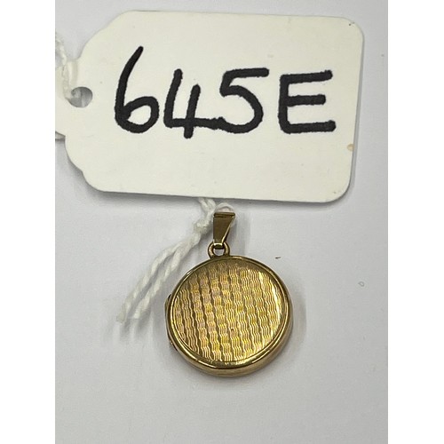 645E - 9ct gold locket. approx 3g