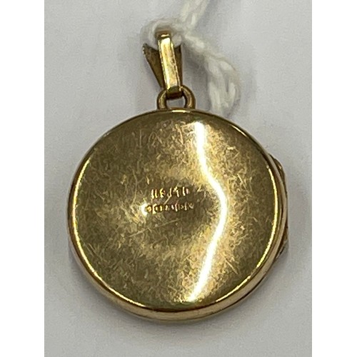 645E - 9ct gold locket. approx 3g