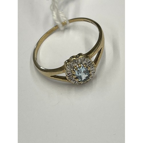 645H - 9ct gold blue stone + diamond ring. Size U. approx 1.6g gross