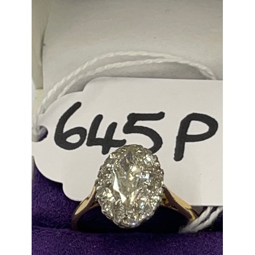 645P - Victorian 18ct gold oval centre stone diamond ring surrounded by small diamonds. centre stone betwee... 