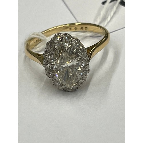 645P - Victorian 18ct gold oval centre stone diamond ring surrounded by small diamonds. centre stone betwee... 