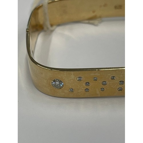 645Q - 9ct gold heavy bangle with 2 large + 20 small diamonds. approx 47.4g gross