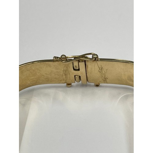 645Q - 9ct gold heavy bangle with 2 large + 20 small diamonds. approx 47.4g gross