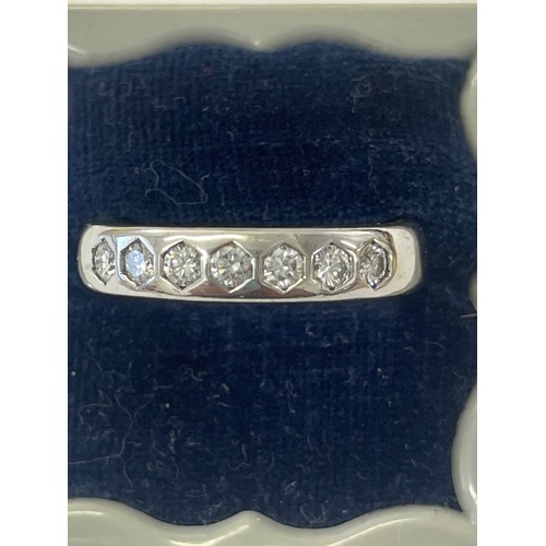 645O - 18ct white gold 7 stone diamond ring. Size N/O. approx 9.9g gross