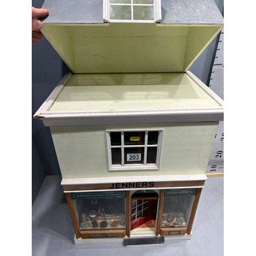 203 - Vintage dolls house/shop with furniture & shop fittings 'jenners'