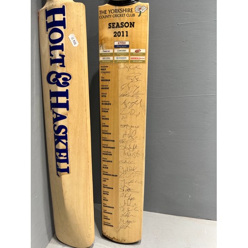 217 - 2 Signed cricket bats