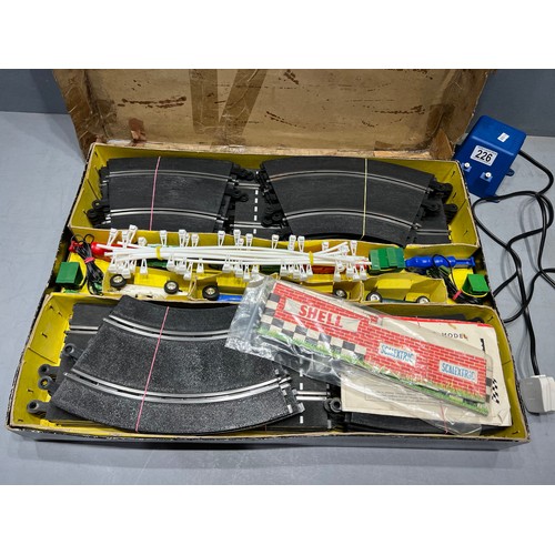 226 - Vintage boxed scalextric 4 in 1 motor racing set with power pack