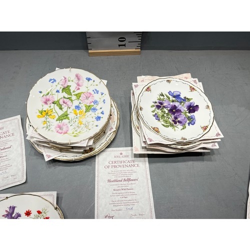 84 - 20 Royal Albert etc wall plates 'The Queen Mothers favourite flowers'