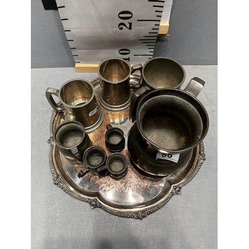 88 - Tray pewter etc tankards. Tray included