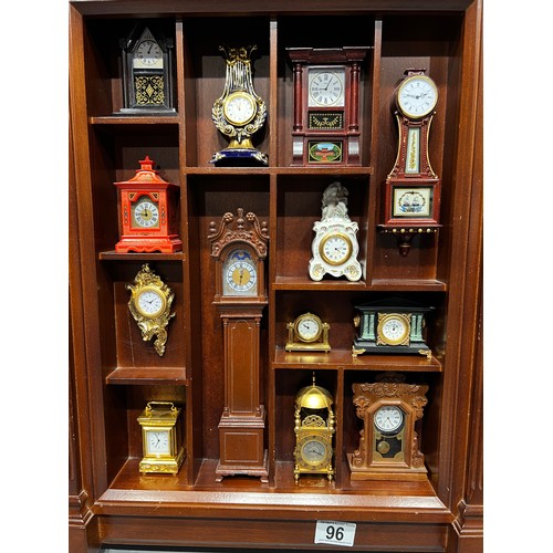 96 - Franklin mint 'The collectors treasury of clocks' in cabinet