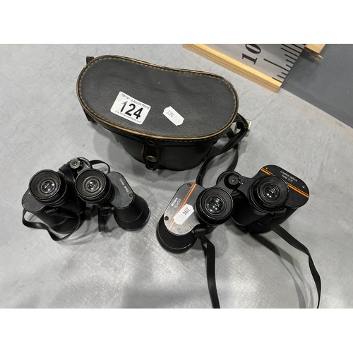 124 - 2 pairs binoculars. One in case