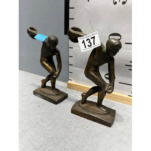 137 - Pair of metal discus men