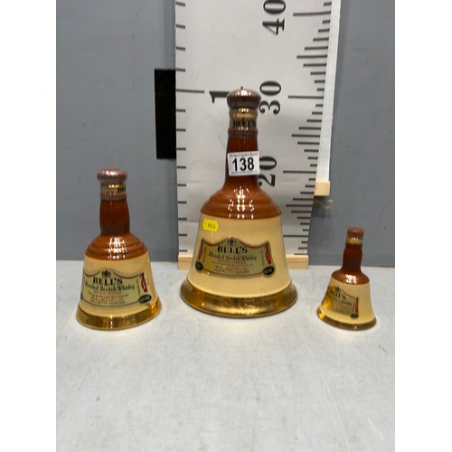 138 - 3 graduated Bells Scotch whiskey bells. Large is full and unopened