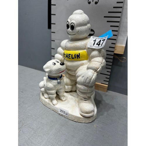 147 - Advertising Cast iron Michelin man with dog