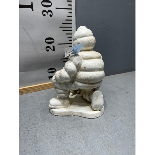 147 - Advertising Cast iron Michelin man with dog