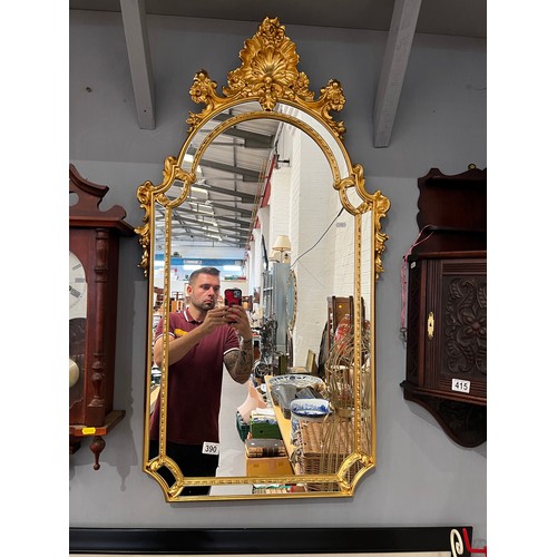 390 - Decorative gilt framed wall mirror