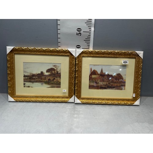 484 - 2 gilt framed pictures still in wrapping. 'Village Scenes'