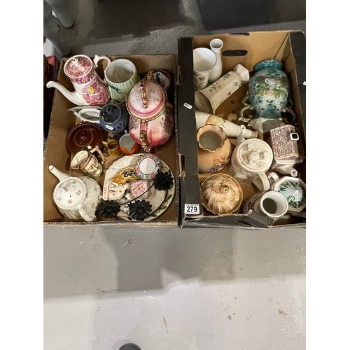 279 - 2 Boxes collectable pottery tea pots, vases etc