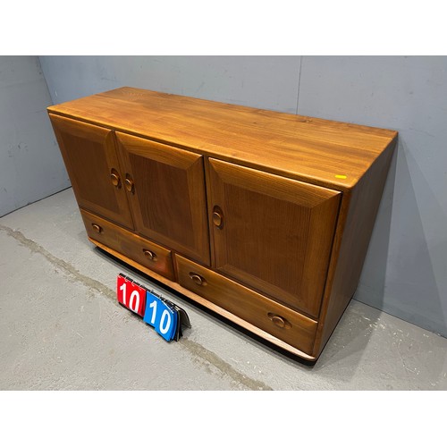 1010 - Blonde ercol sideboard. Very clean good grain