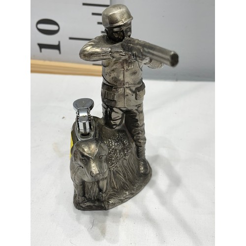 35 - Vintage shooting man + Hunting dog cigarette lighter