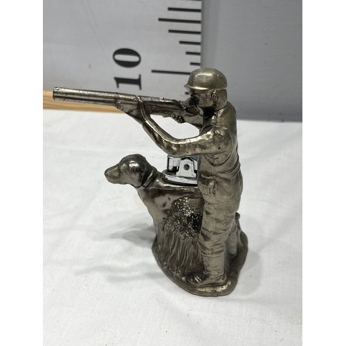 35 - Vintage shooting man + Hunting dog cigarette lighter