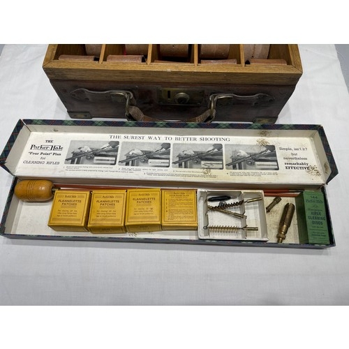 74 - The Parker-Hale Rifle cleaning kit boxed + leather + brass cartridge case initialled W.L.C. Coopland... 