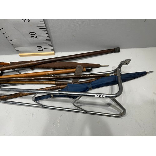 103 - Quantity walking sticks, umbrella etc