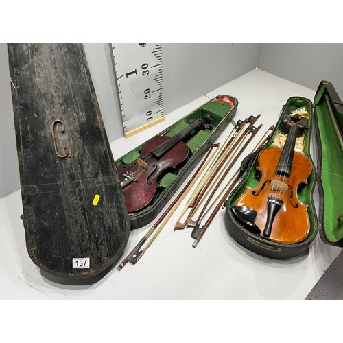 137 - 2 violins in cases + quantity bows