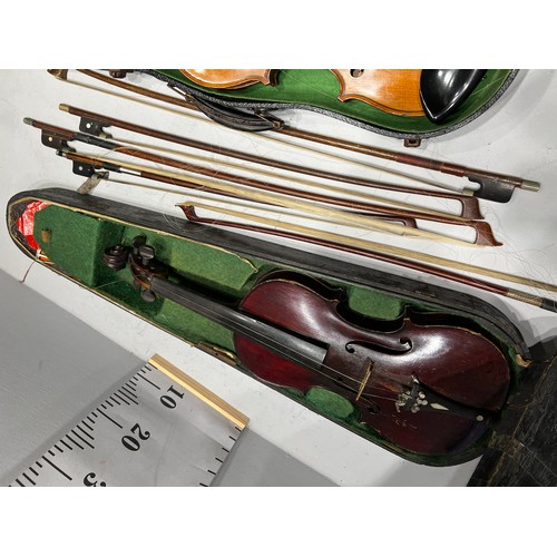 137 - 2 violins in cases + quantity bows