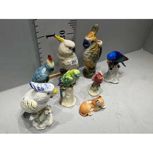 201 - 7 bird figures + Lion figure