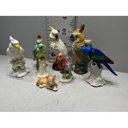 201 - 7 bird figures + Lion figure