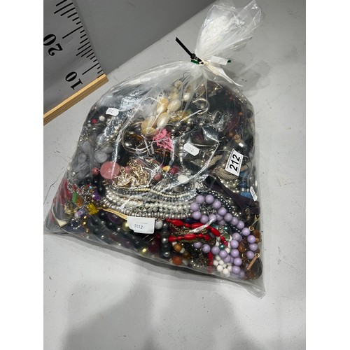 212 - Large bag of costume jewellery