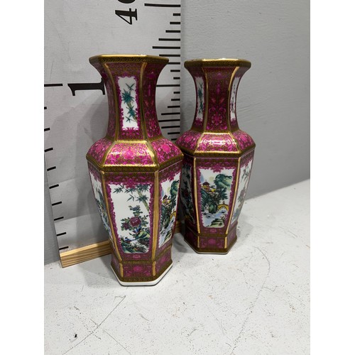 410 - Pair of tall pink Chinese vases