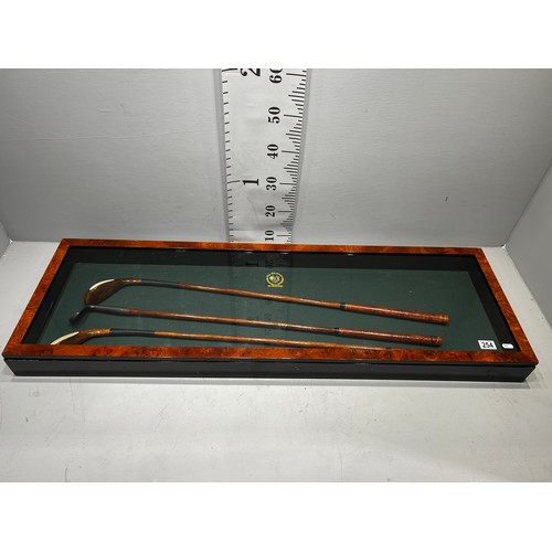 254 - Superb golfing display cabinet 'The old course' St Andrews showing 3 vintage golf clubs signed 'The ... 