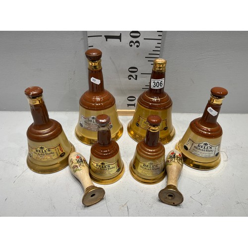 306 - 6 Bells whiskey decanters + pair beer pump handles