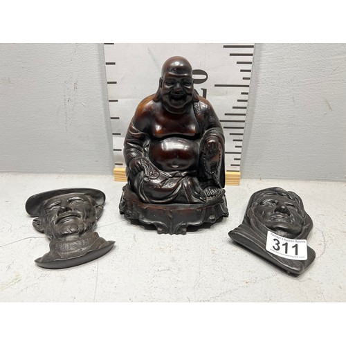 311 - Buddha figure + 2 Irish face plaques