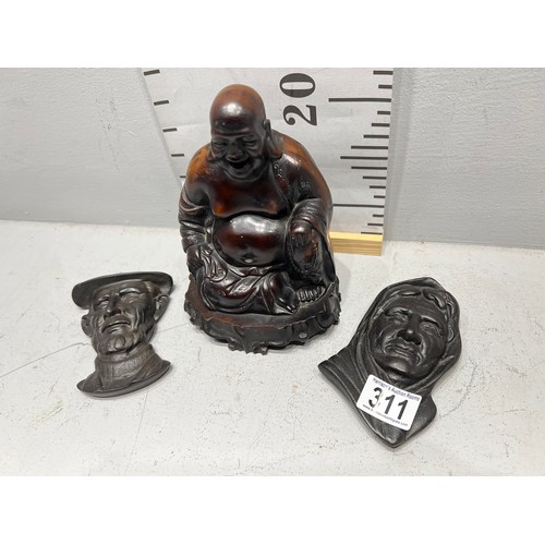 311 - Buddha figure + 2 Irish face plaques